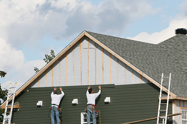 Professional Emergency Siding Repair technician working in Brooklyn, OH